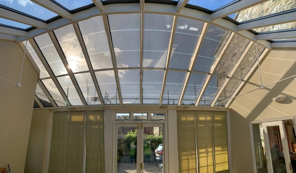 DC - Domestic Conservatory incorportatin transparent solar glass and a battery storage system